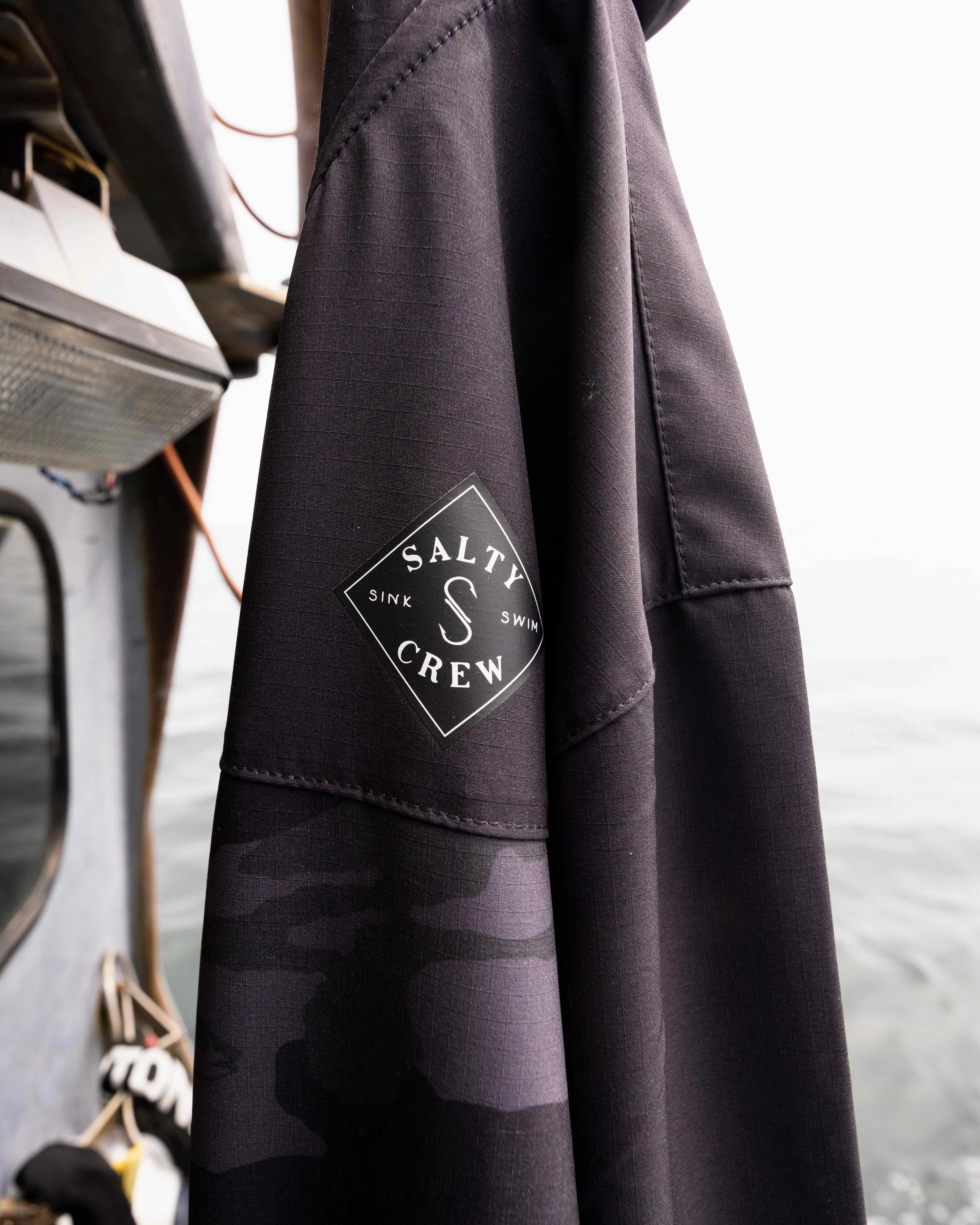 Adjustable Hemline Stowaway Jacket - Black Camo